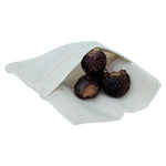 Natural cotton soap nut wash bag open with soapberries inside