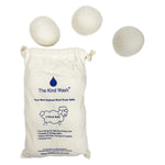 The Kind Wash wool dryer balls in open linen drawstring storage bag